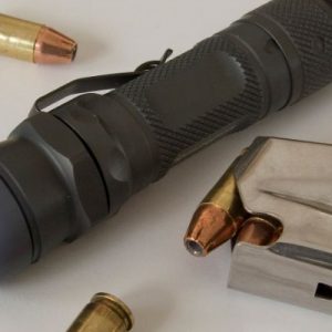 Which Is Better: Weapon-Mounted Lights or Handheld Lights?