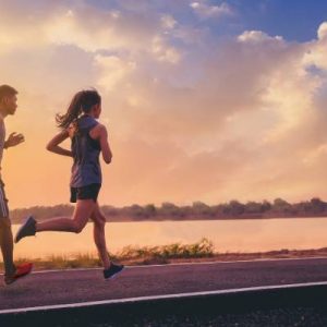 A couple sprinting down a road, training themselves so that they’re ready to race the next marathon together.