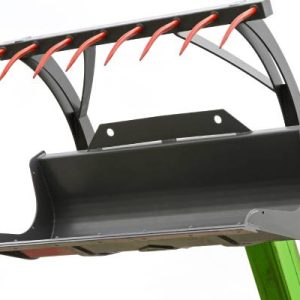 A grapple fork is attached to the end of a green piece of machinery. The fork pieces are bright orange.